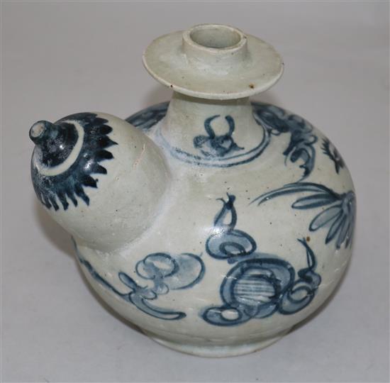 An Annamese blue and white porcelain kendi, 15th century, 15.5cm, sea-etched glaze